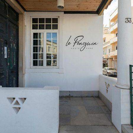 Le Penguin Hostel Faro Bagian luar foto