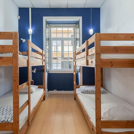 Le Penguin Hostel Faro Bagian luar foto